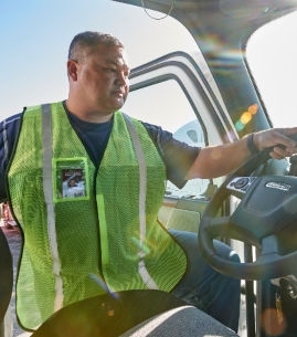 Driver entering truck